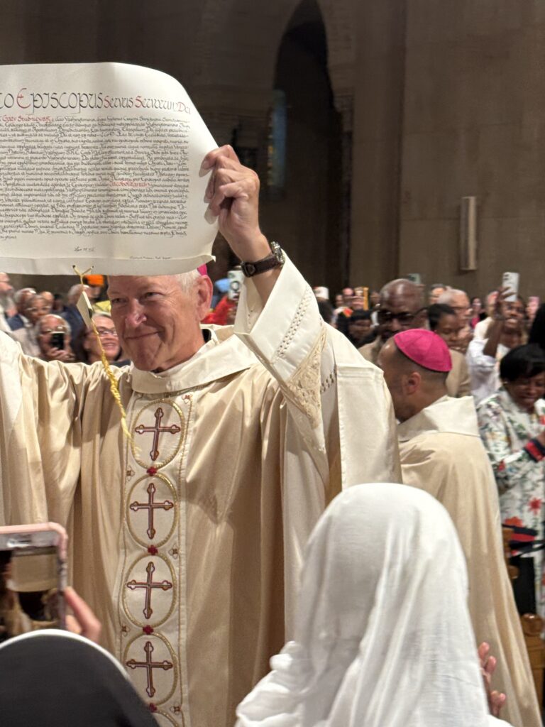 Bishop Gray displaying his proclamation